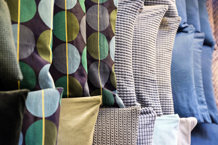 Choosing the Right Fabrics for Throws, Cushions, and Rugs: A Guide for UK Homes